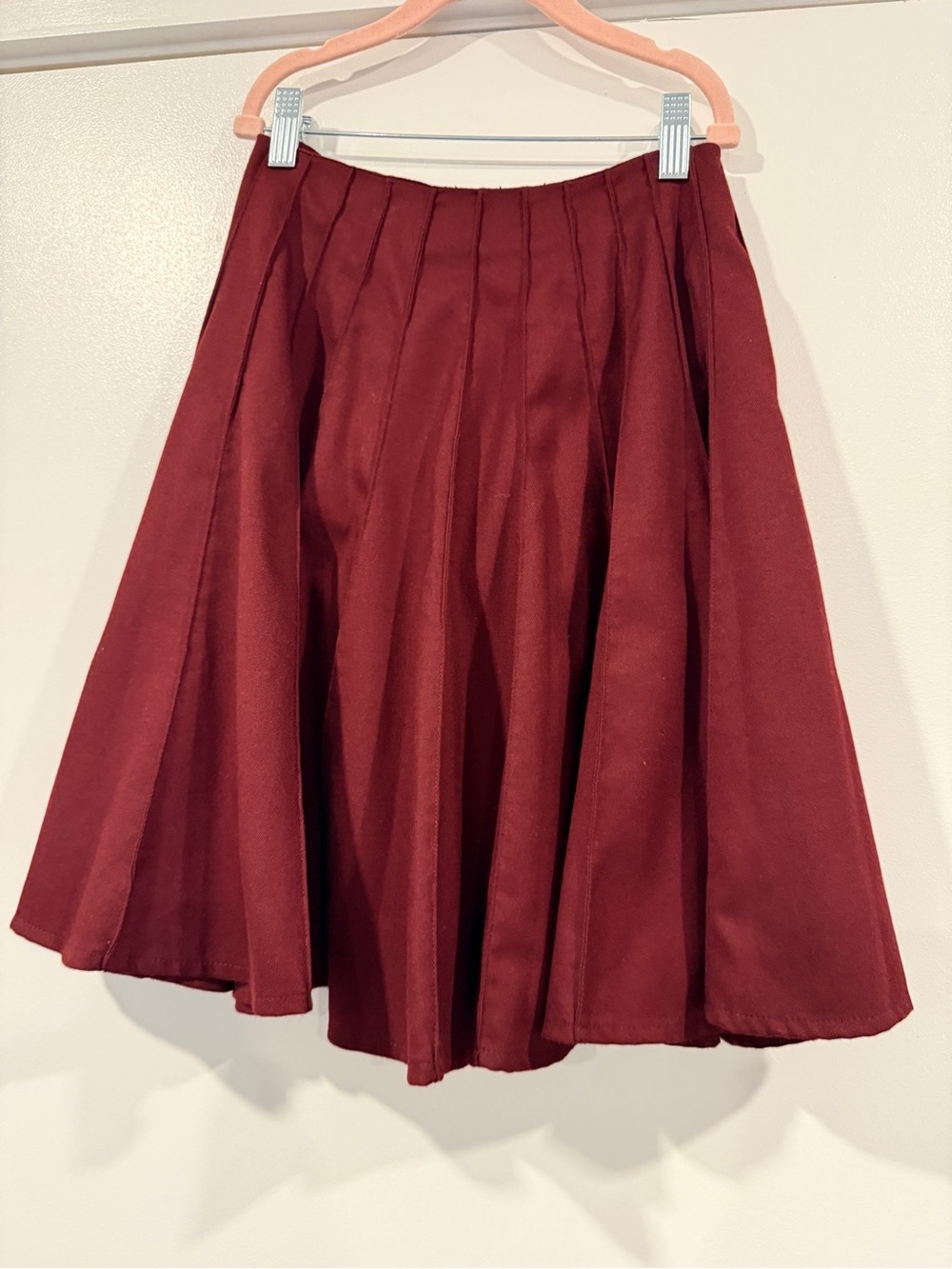 Girls burgundy a line pleated knee length skirt
